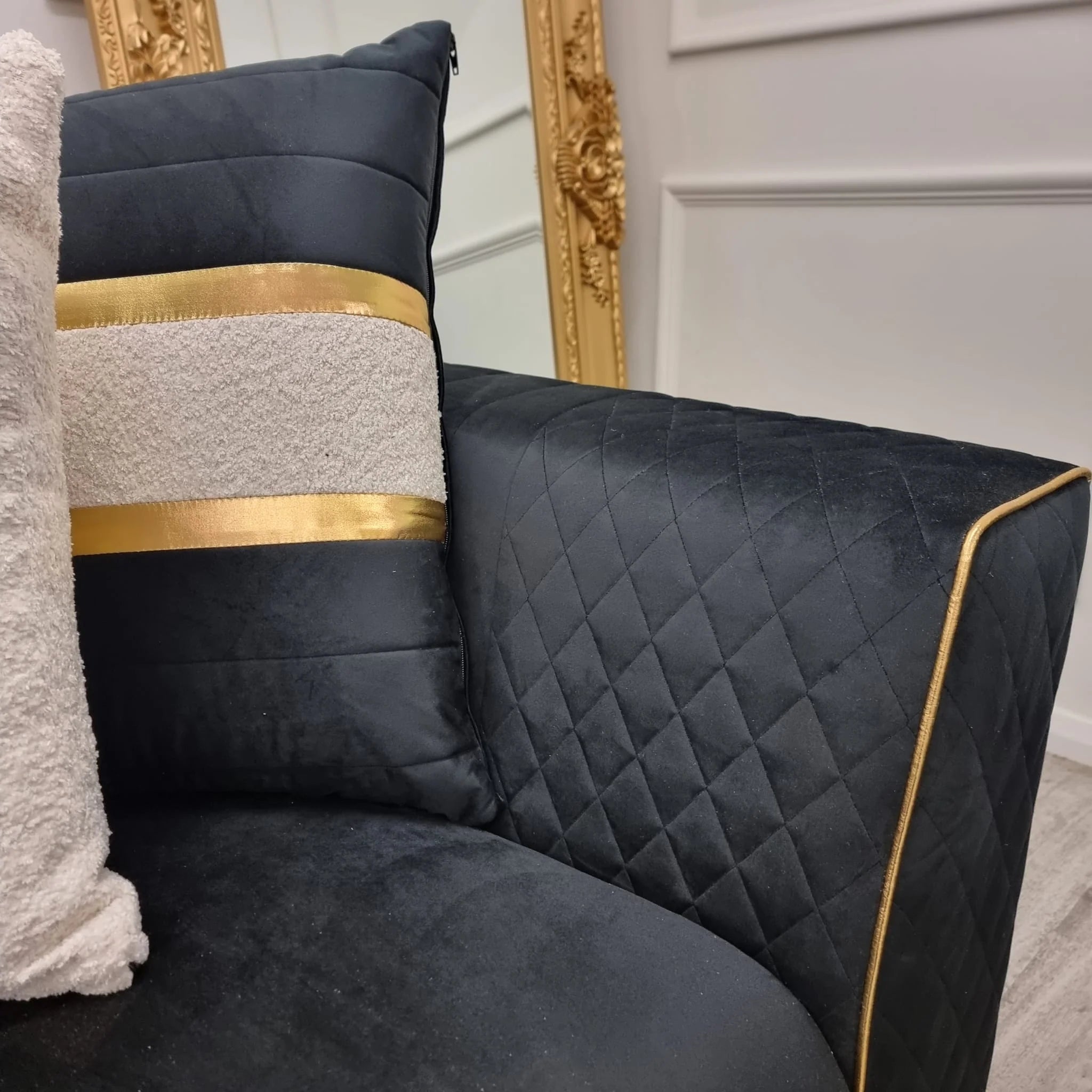 Gold and on sale black sofa